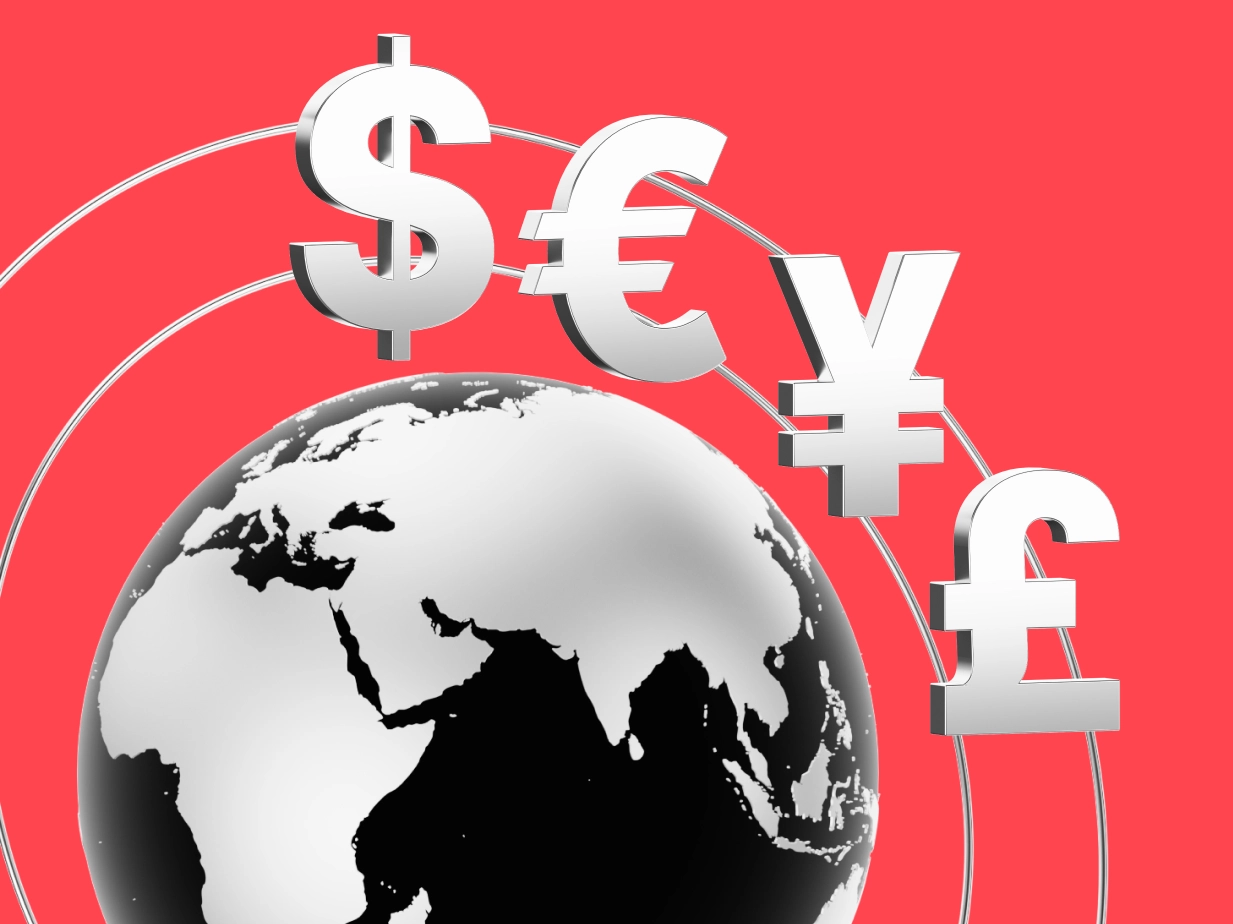 A metallic globe showing part of Europe, Africa, and Asia is set against a red background, with large silver currency symbols ($, €, ¥, £) orbiting above it, representing global forex trading.