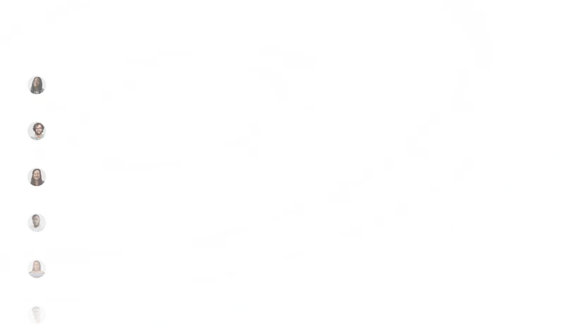 A group of people walking up a hill.
