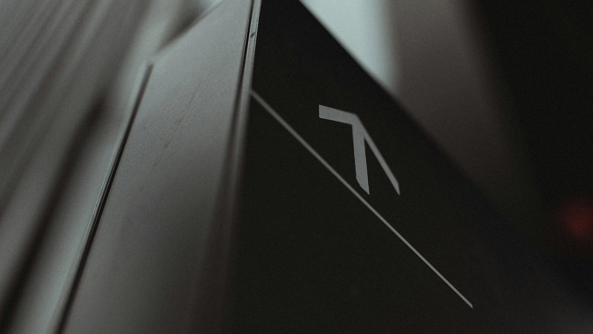 Close-up of upward arrow on dark background symbolising career growth and mentorship in PR.