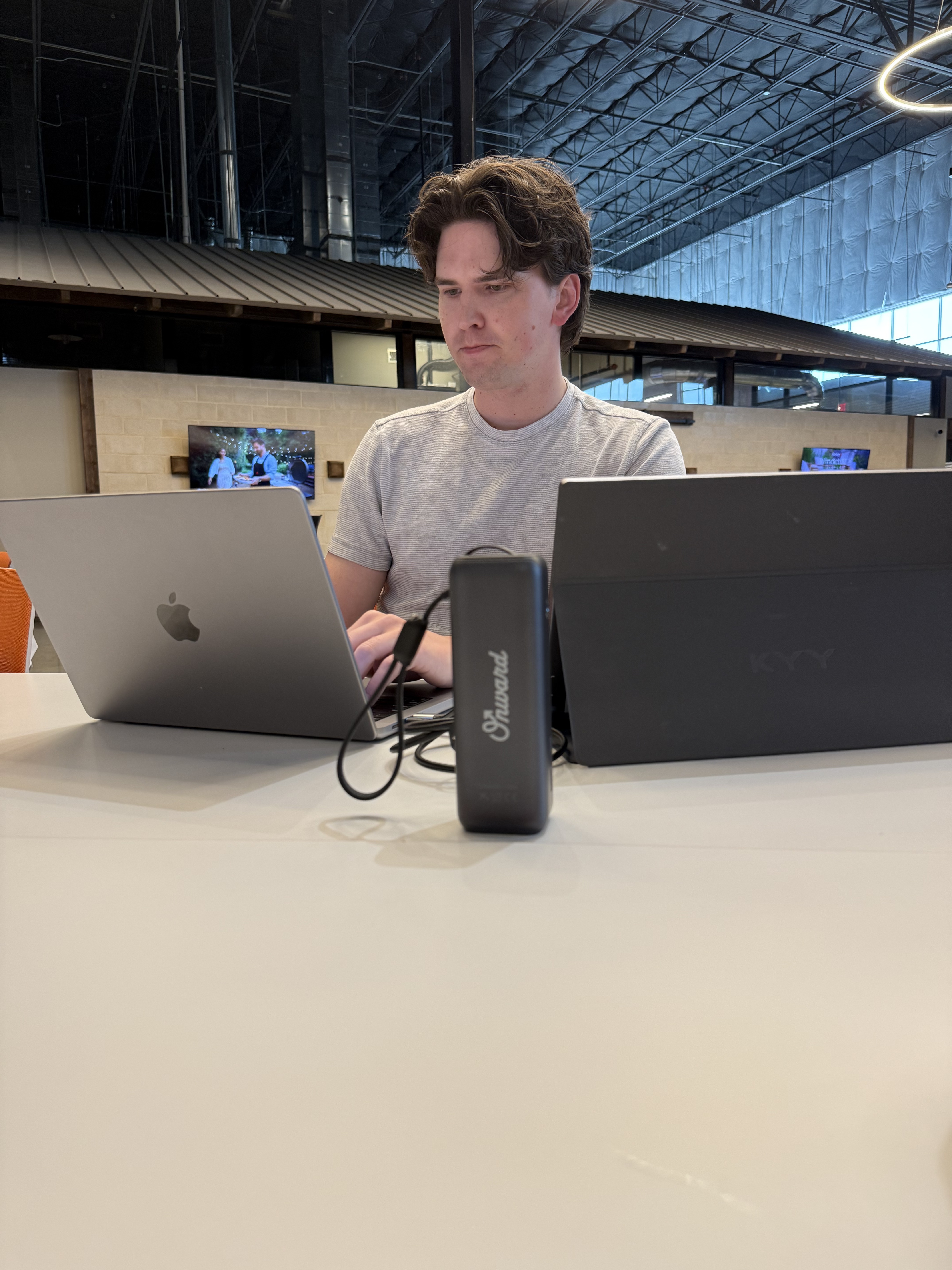 Onward team member building and managing campaigns on a laptop
