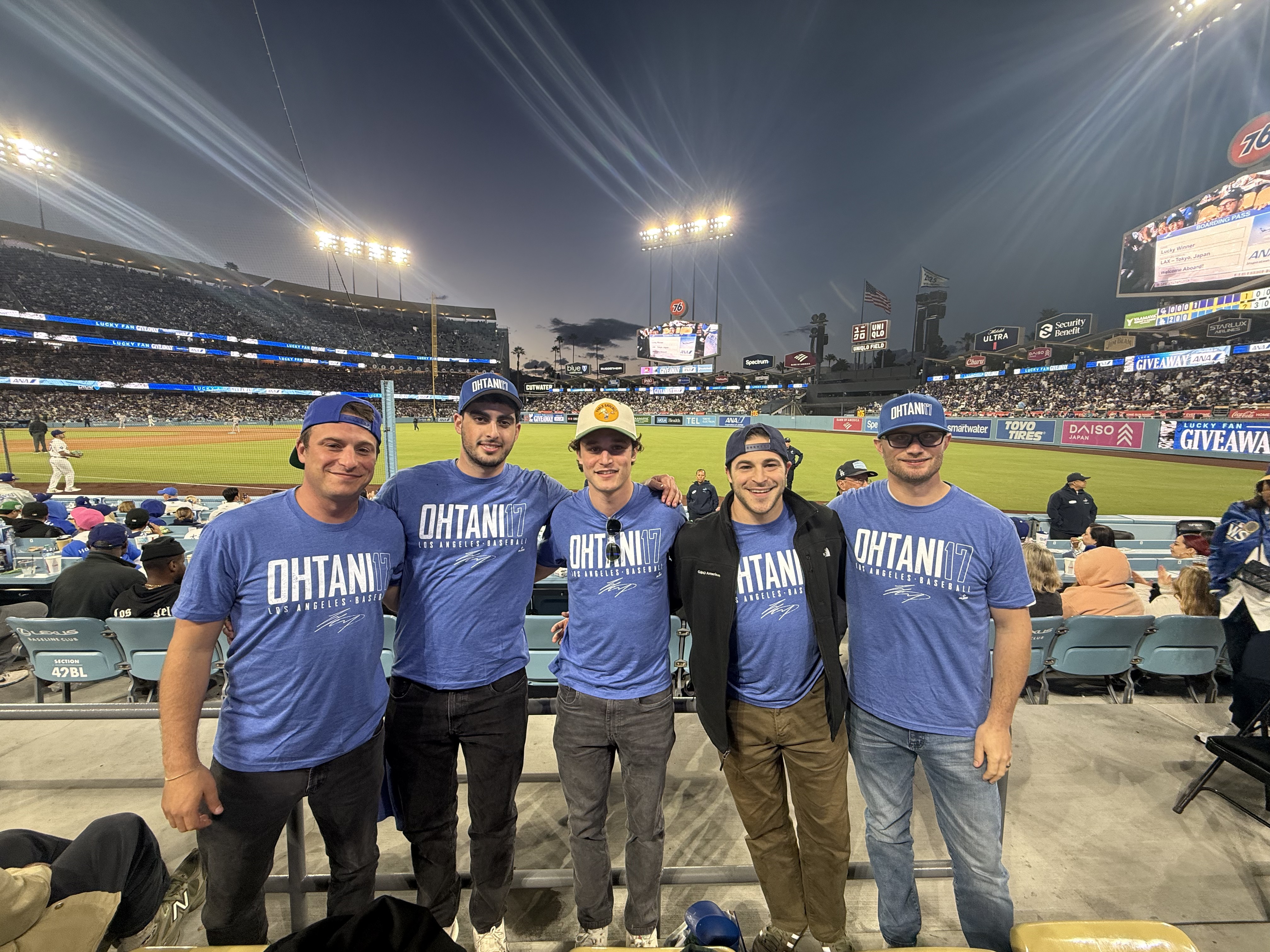 Five members of the Onward team in matching Ohtani shirts at Dodger Stadium