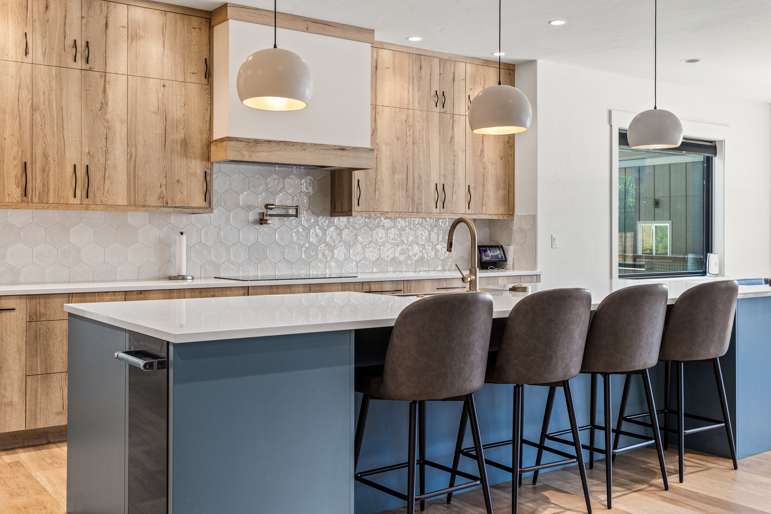 image of kitchen with island and wood cabinets 