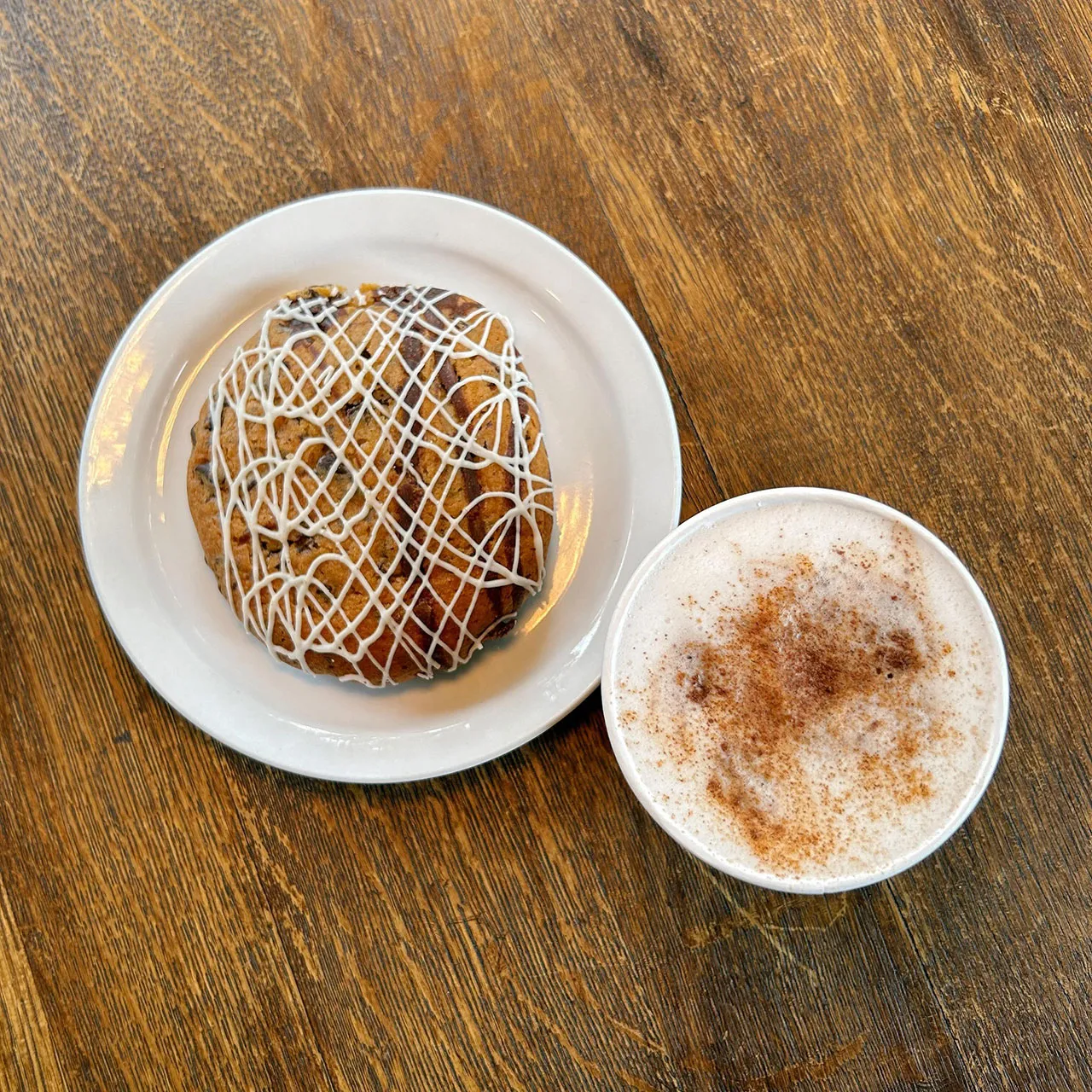 Cookies and cream cookie with cinnamon &  coffee beverage