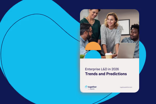 Report cover: "Enterprise L&D in 2026 – Trends and Predictions" from Together, showing colleagues collaborating around a laptop