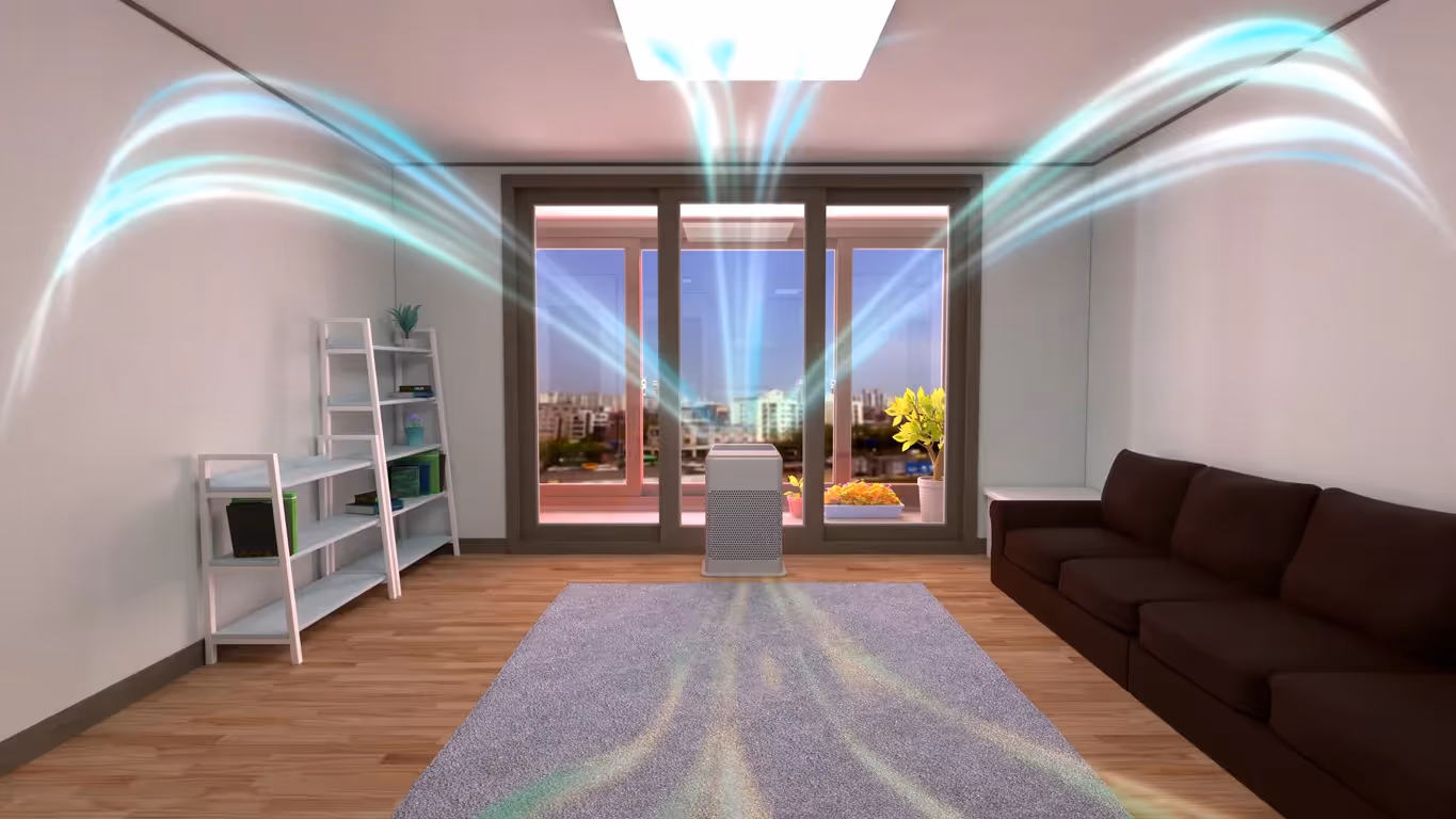 A graphic shows an air purifier in the center of a room, with streams of air flowing out of it