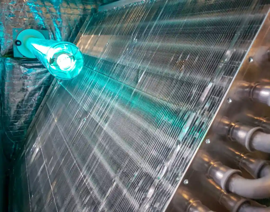 A UV light sanitizing an HVAC coil.