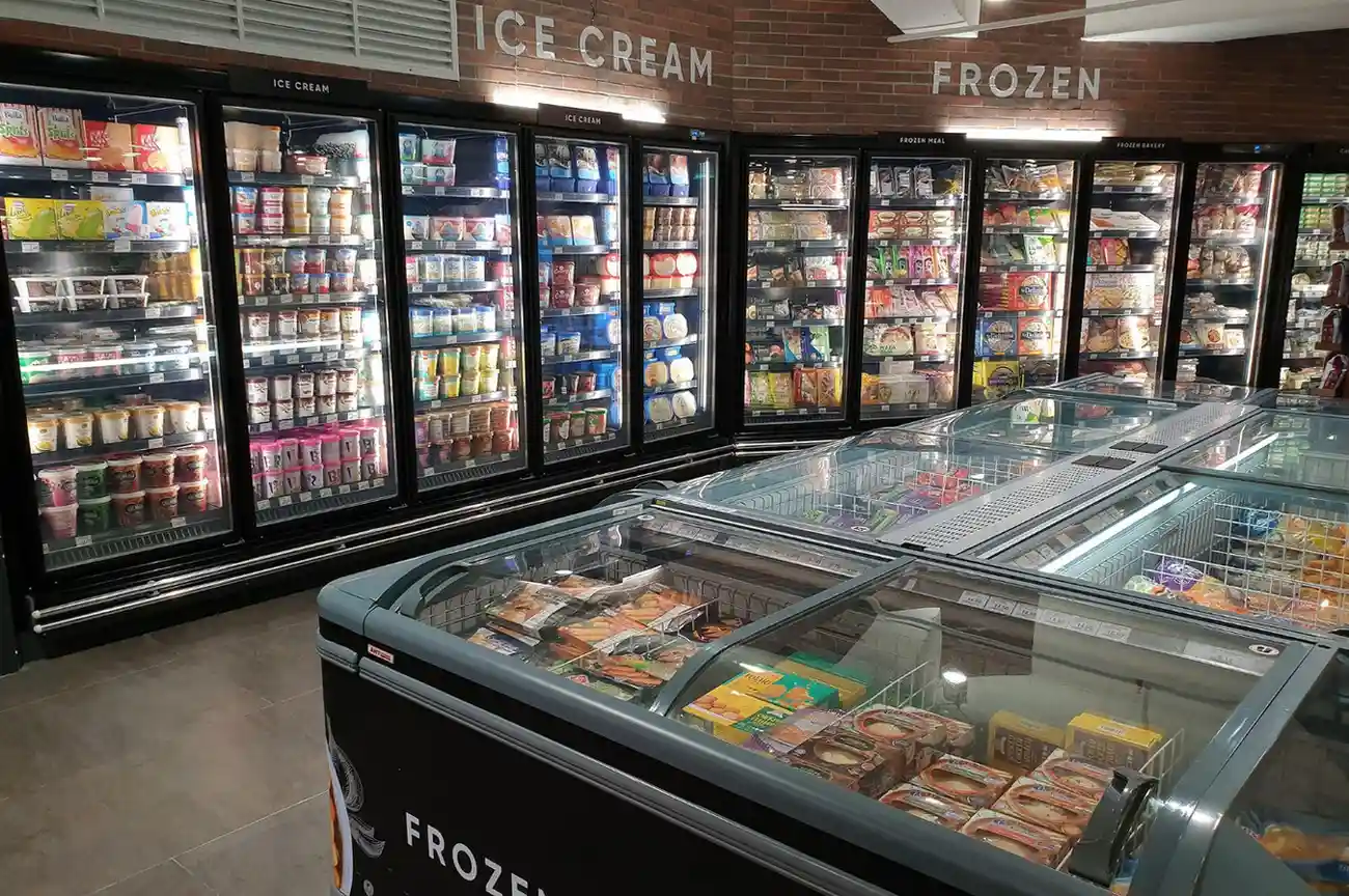 A row of grocery store freezers.