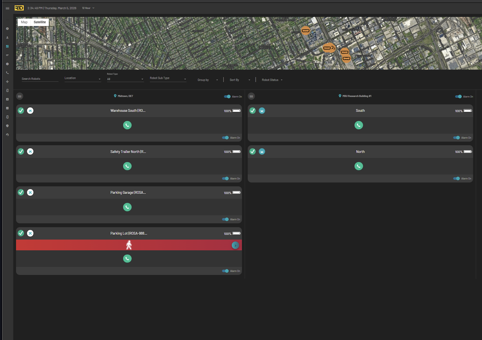 Dashboard showing map with multiple robot locations and status panels including battery levels and alerts.