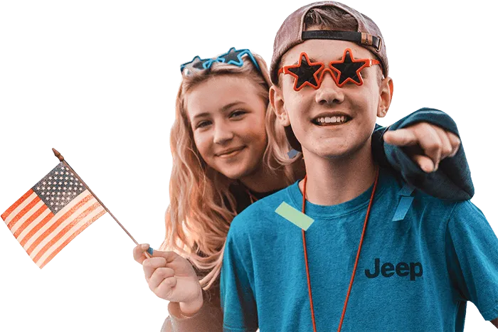 boy and girl student with american flag