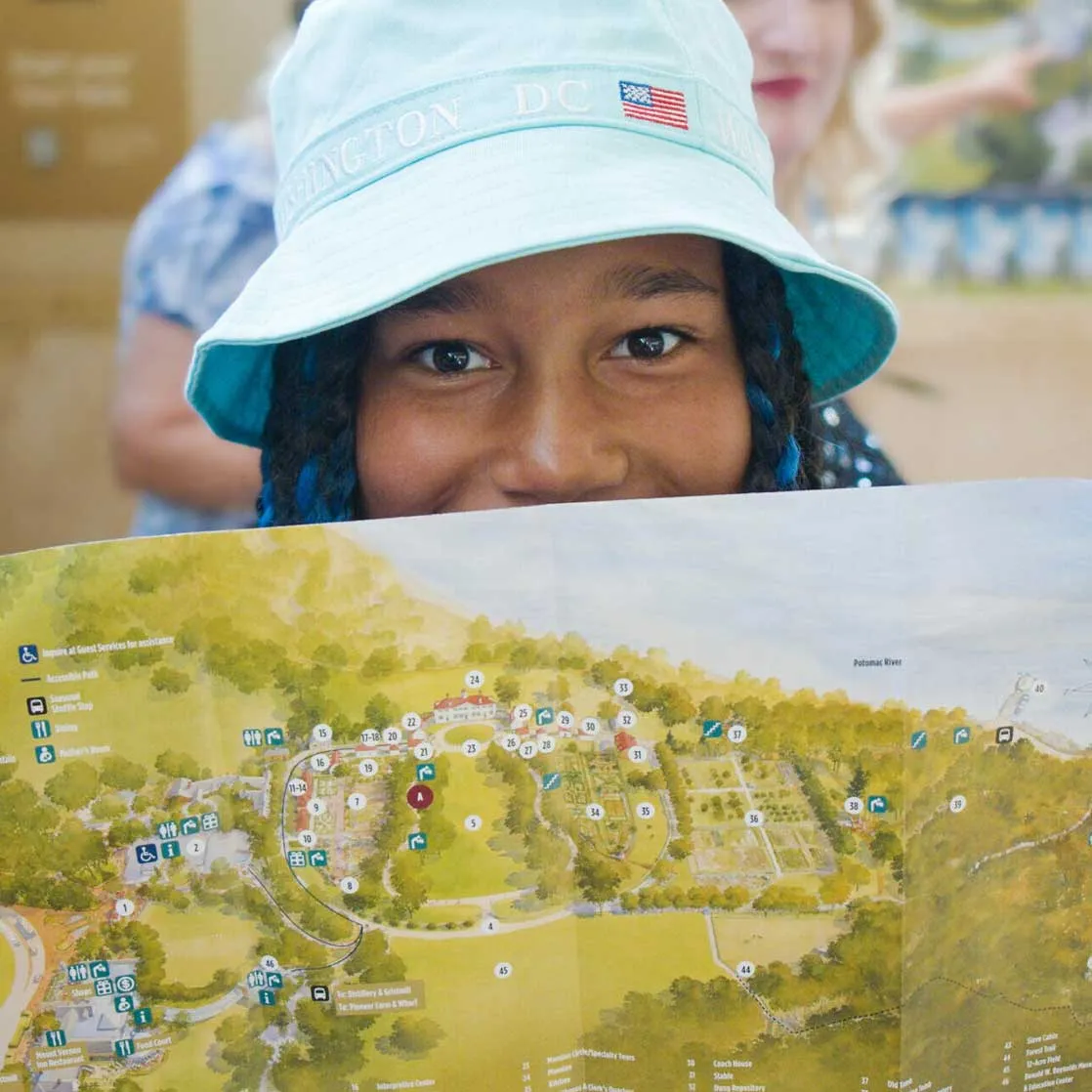 female student holding map