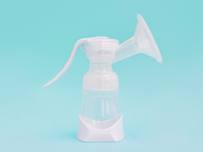 Breast pump on light blue background