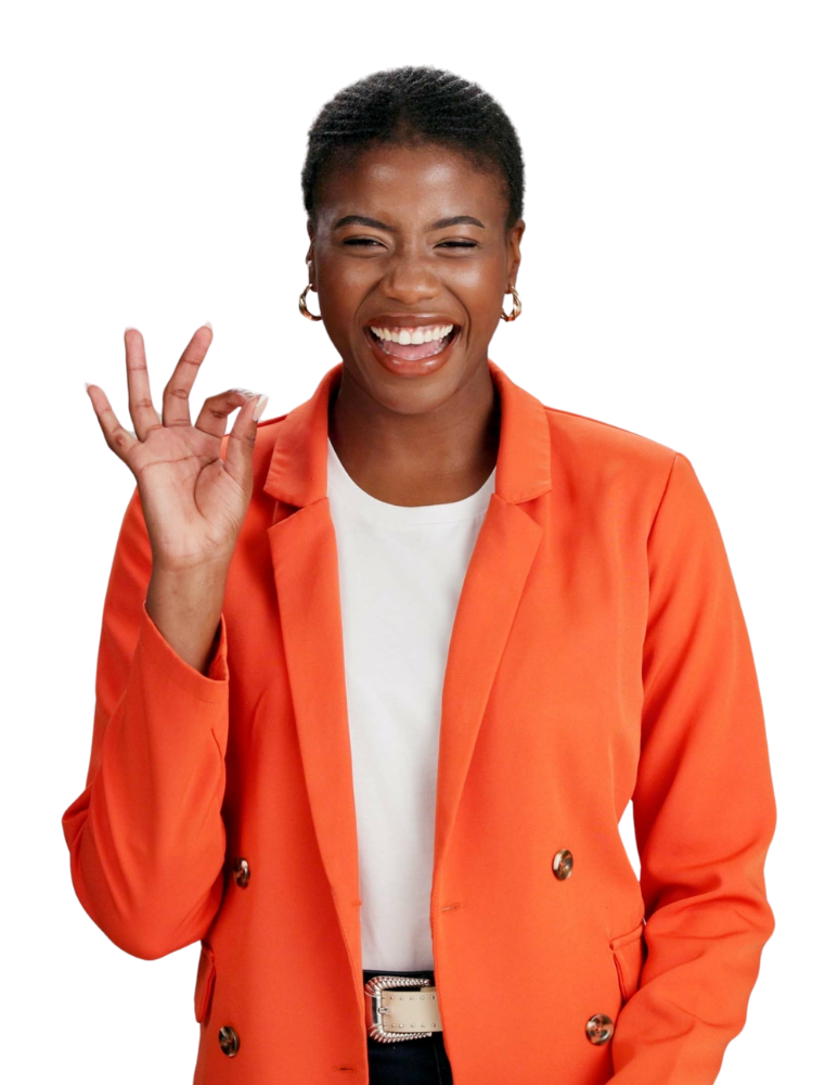 Smiling woman in orange blazer making an OK hand gesture.