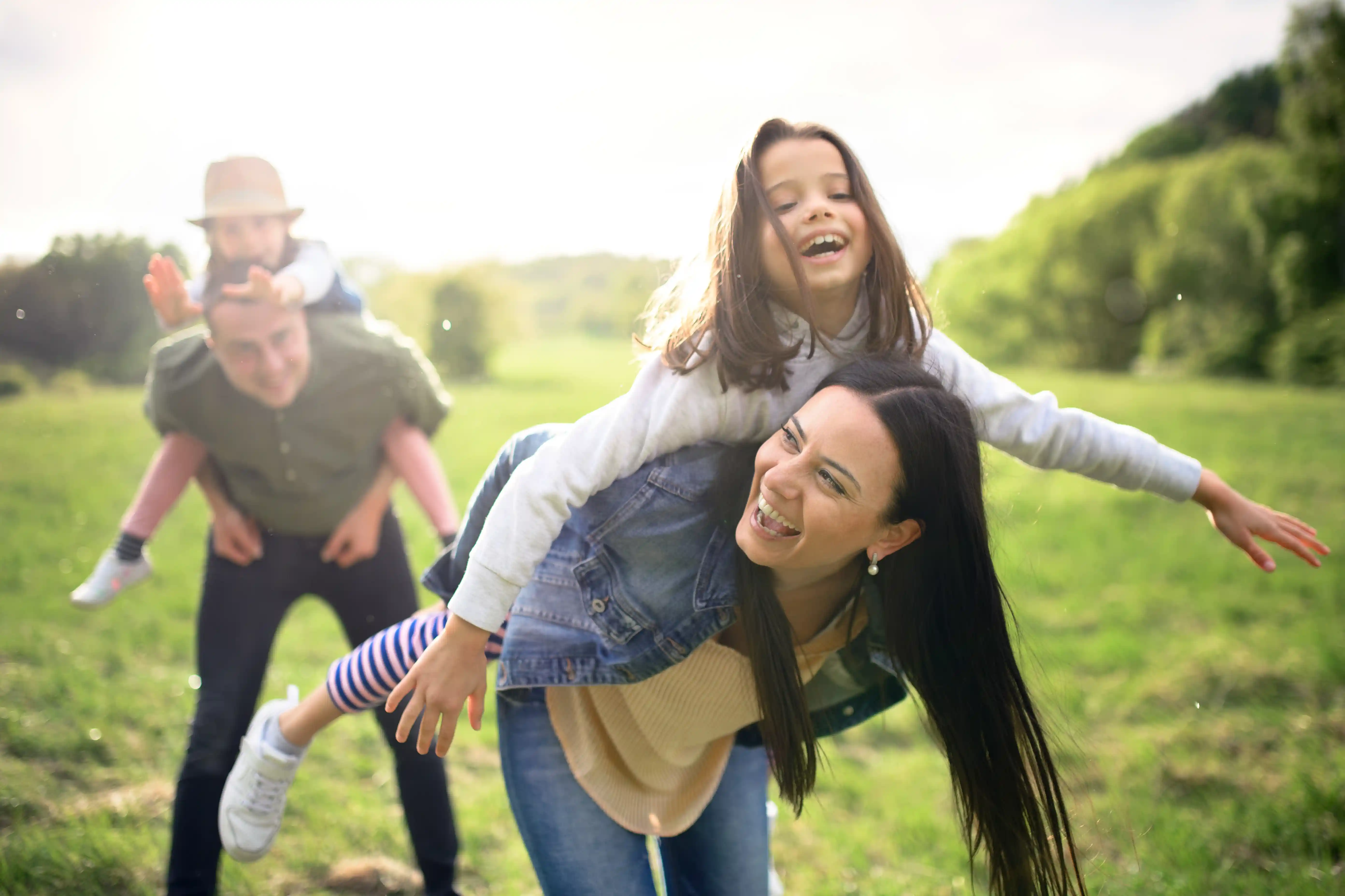 happy family running in field
