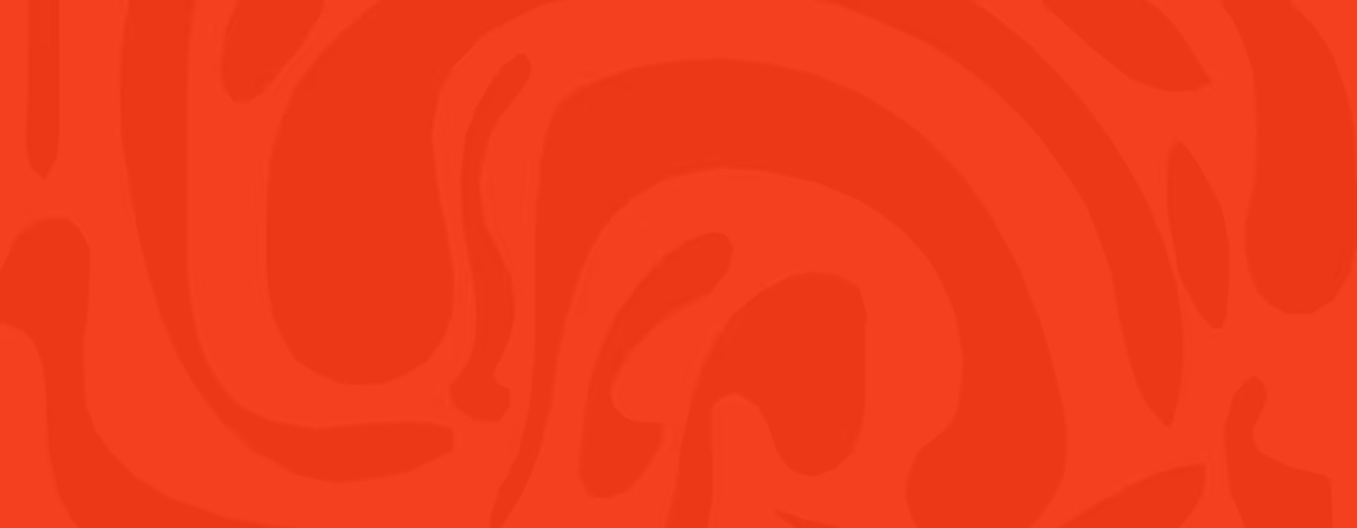 Abstract red background with organic, swirling shapes in varying shades of red.