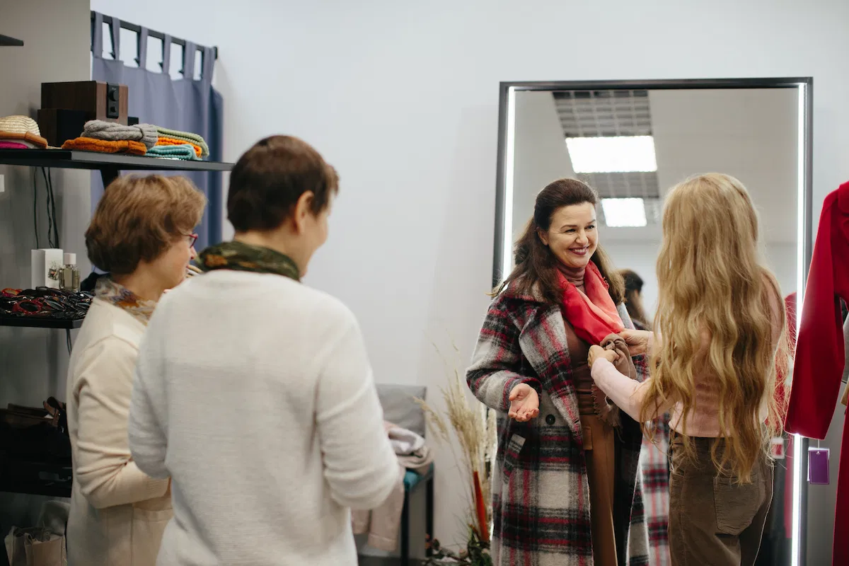 women trying on clothes
