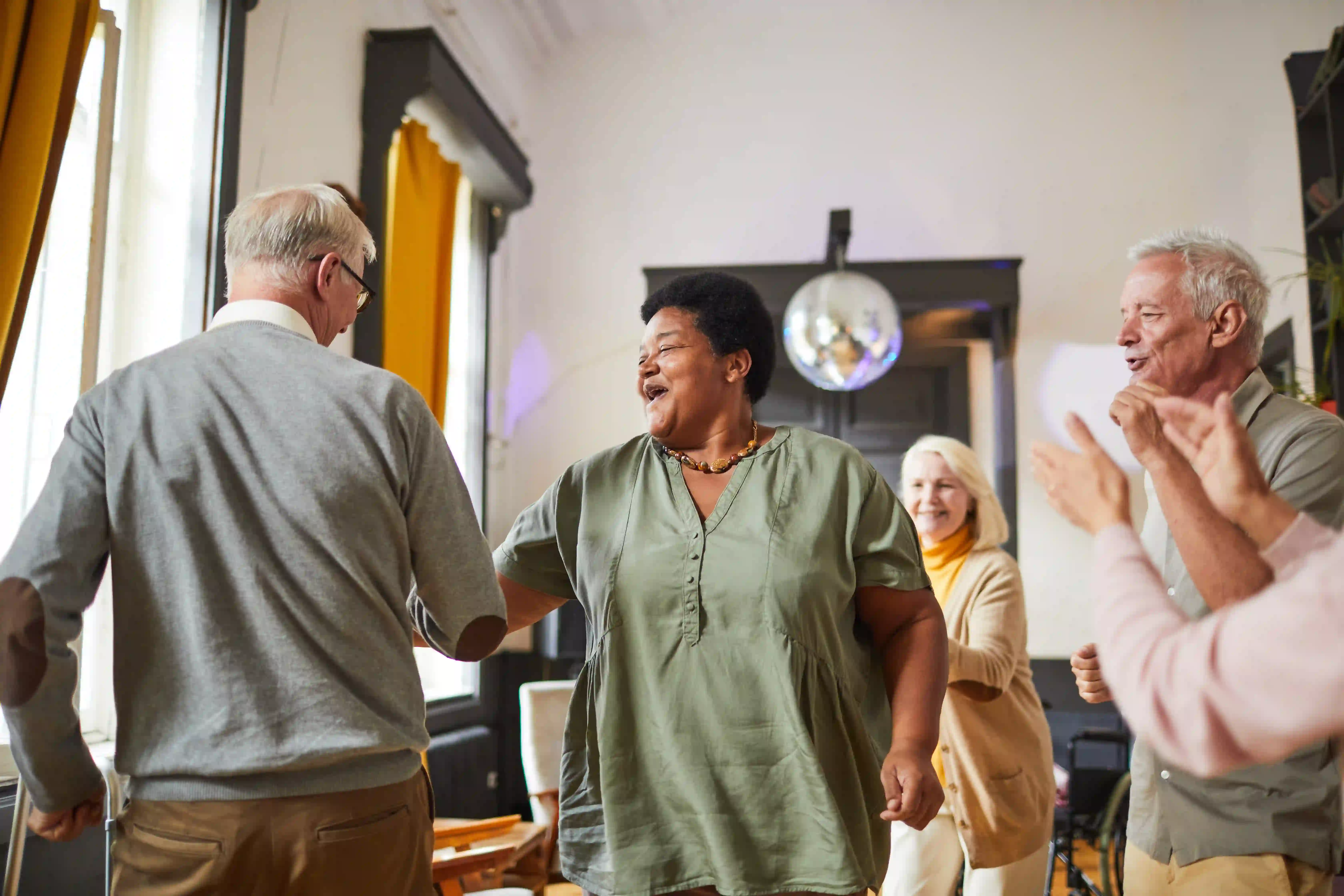senior people dancing together