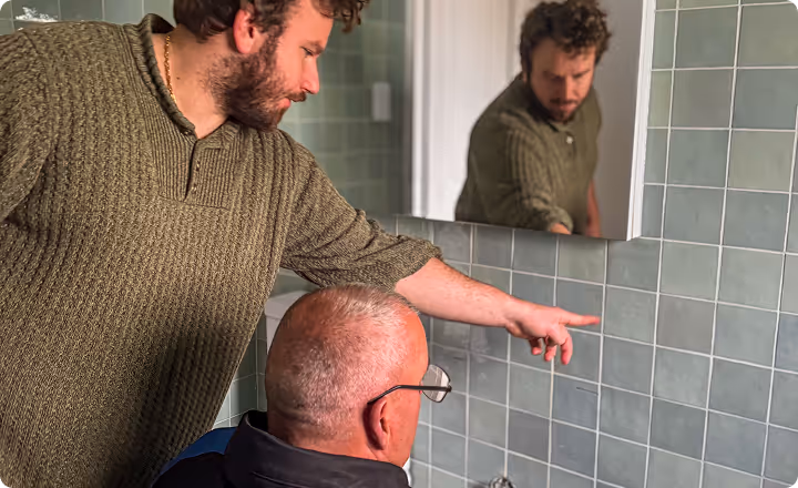 Licensed plumber installing bathroom fixtures during a Blue Mountains renovation