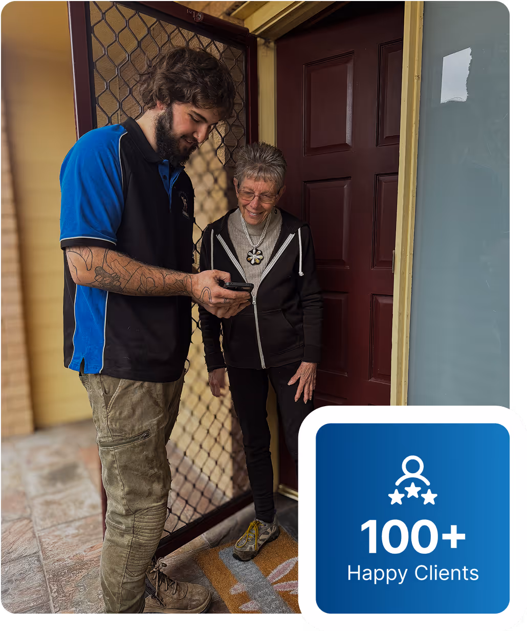 Springwood plumber discussing plumbing quote with homeowner at their home.