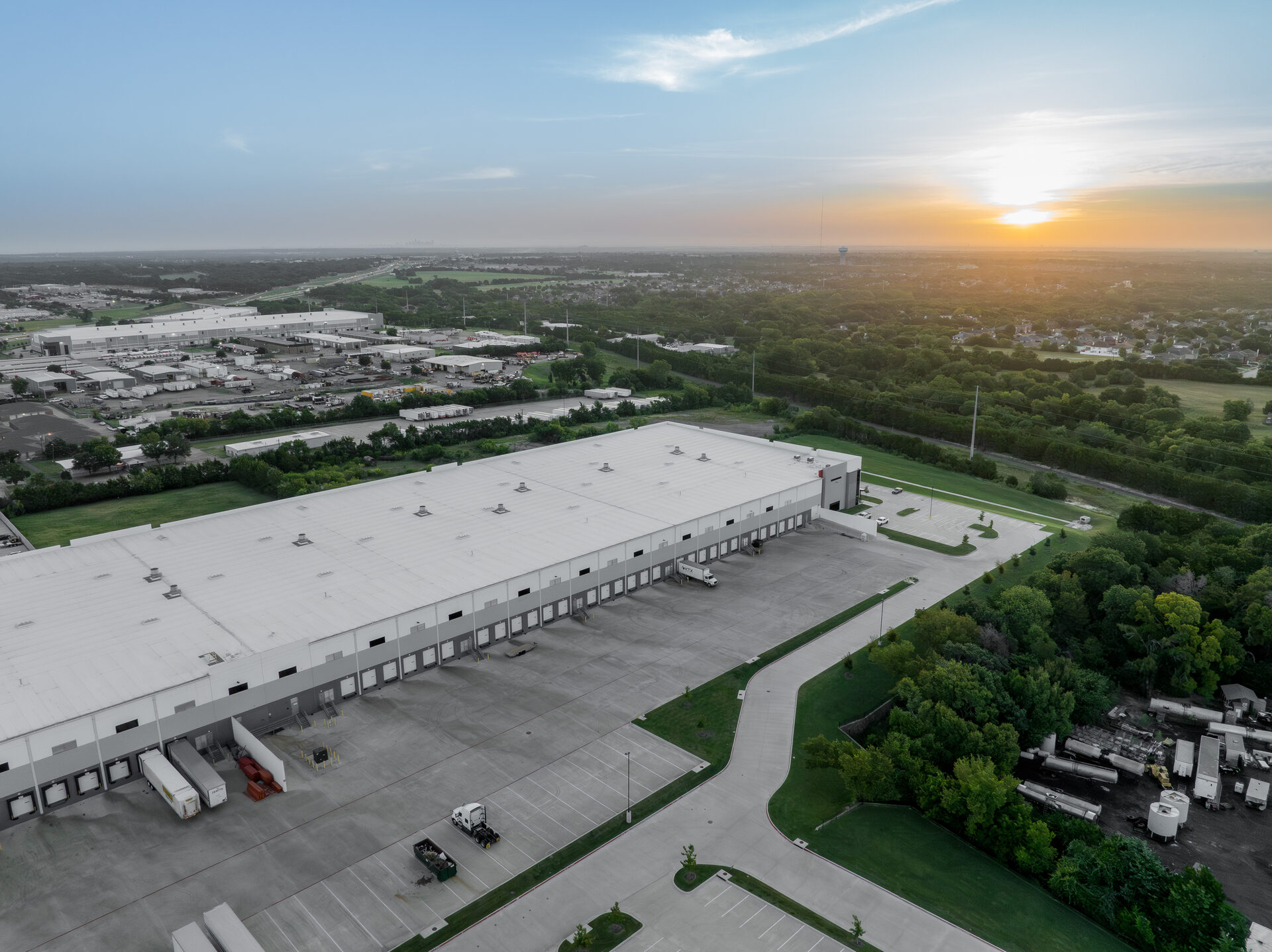 Aerial view of KTX 3PL warehouse facility in Dallas-Fort Worth at sunset