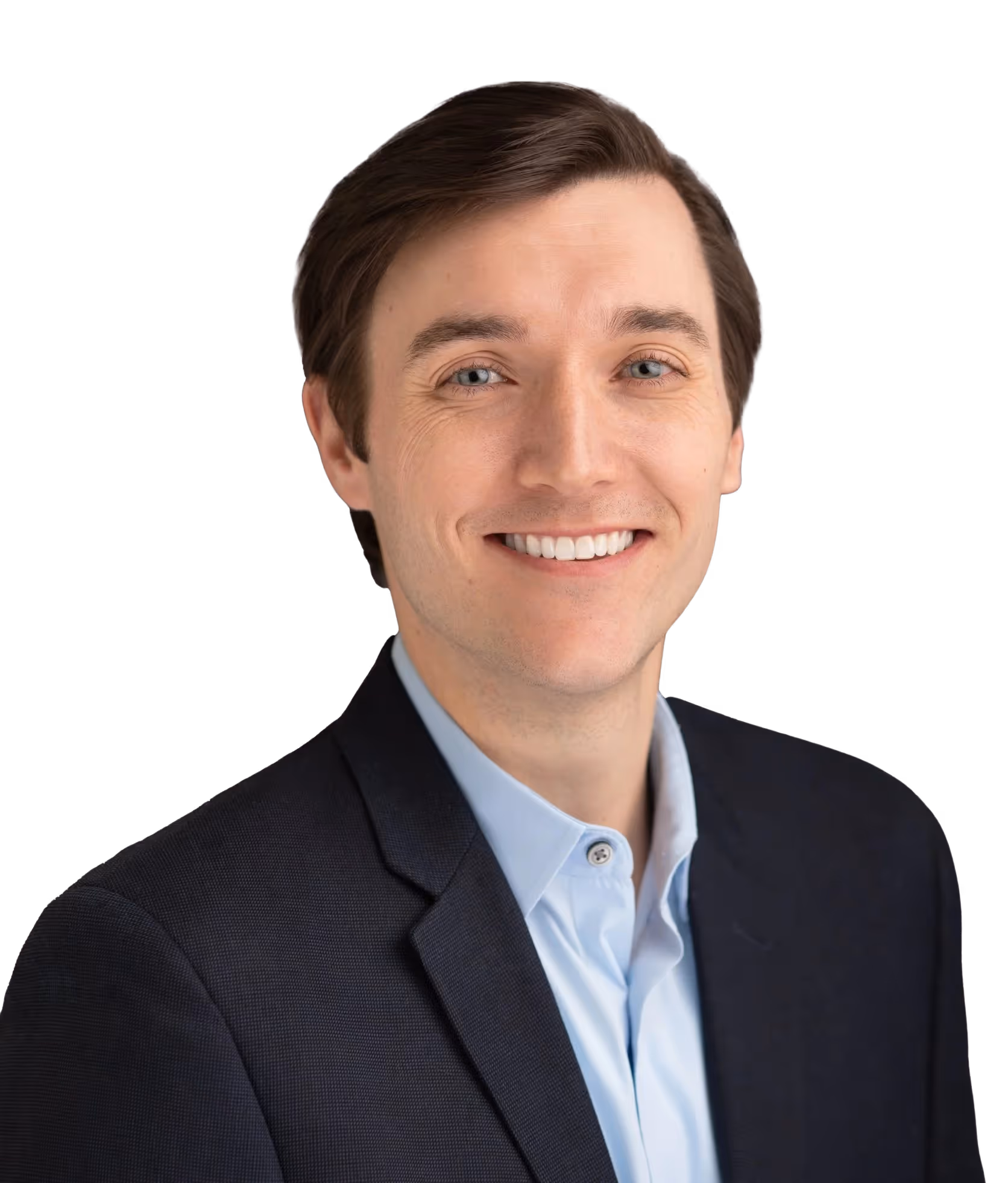 Smiling professional in navy suit and light blue shirt headshot