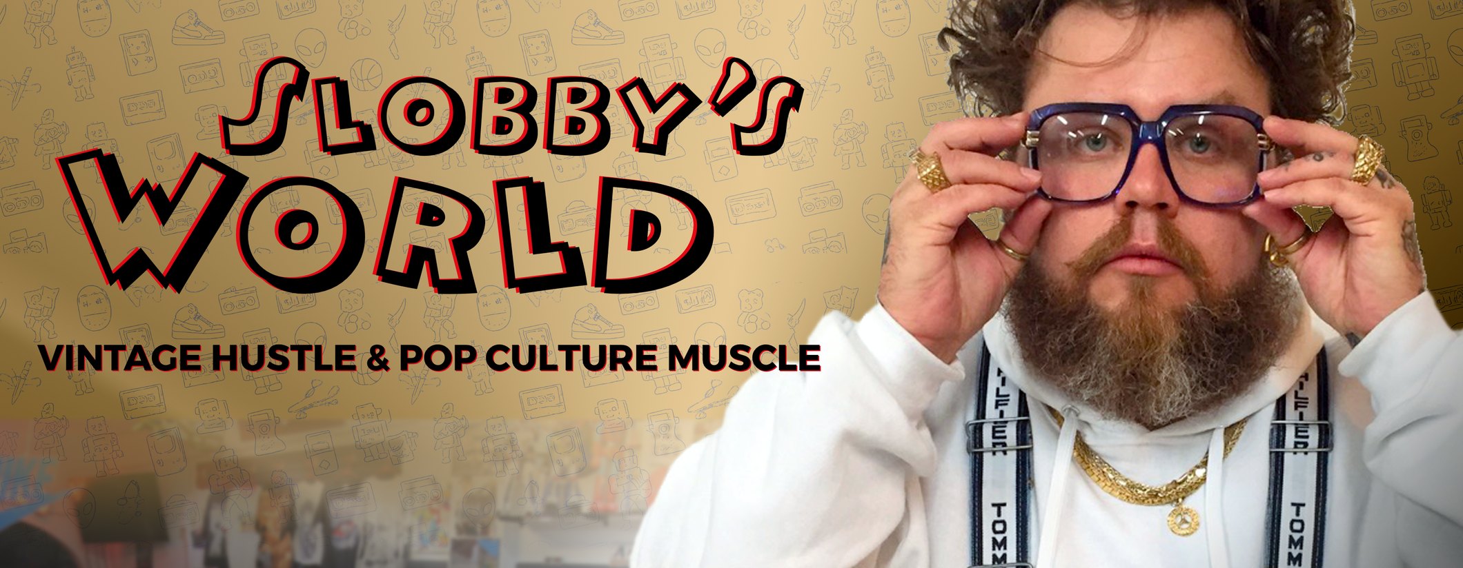 Slobby Robby adjusting his glasses next to the Slobby's World title