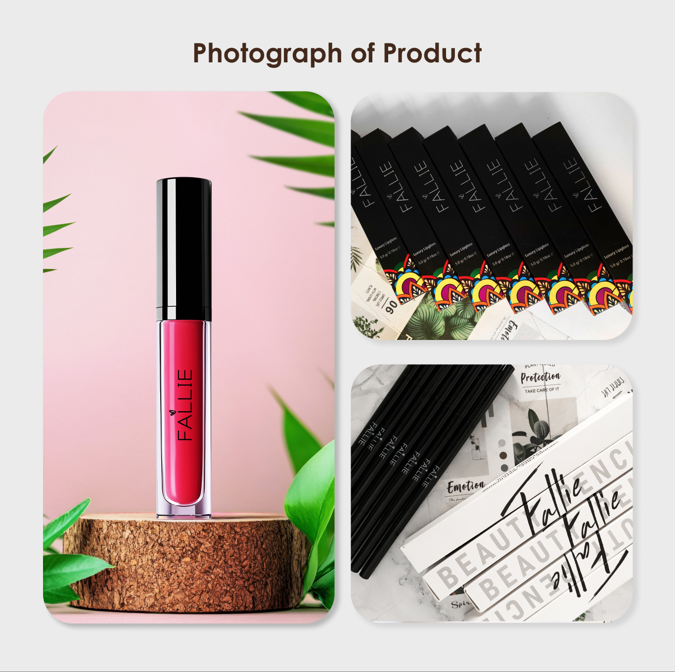 Red Fallie lip gloss in a clear tube with black cap on a wooden pedestal with green leaves, alongside boxed Fallie luxury lip glosses and black Fallie-branded makeup brushes on a marble surface.