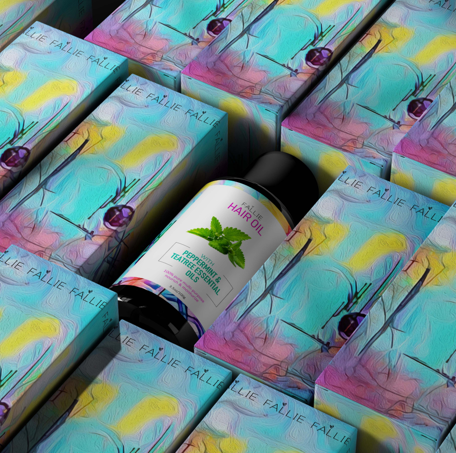 Bottle of Fallie hair oil with peppermint and tea tree essential oils surrounded by colorful pastel blue, yellow, and pink boxes.