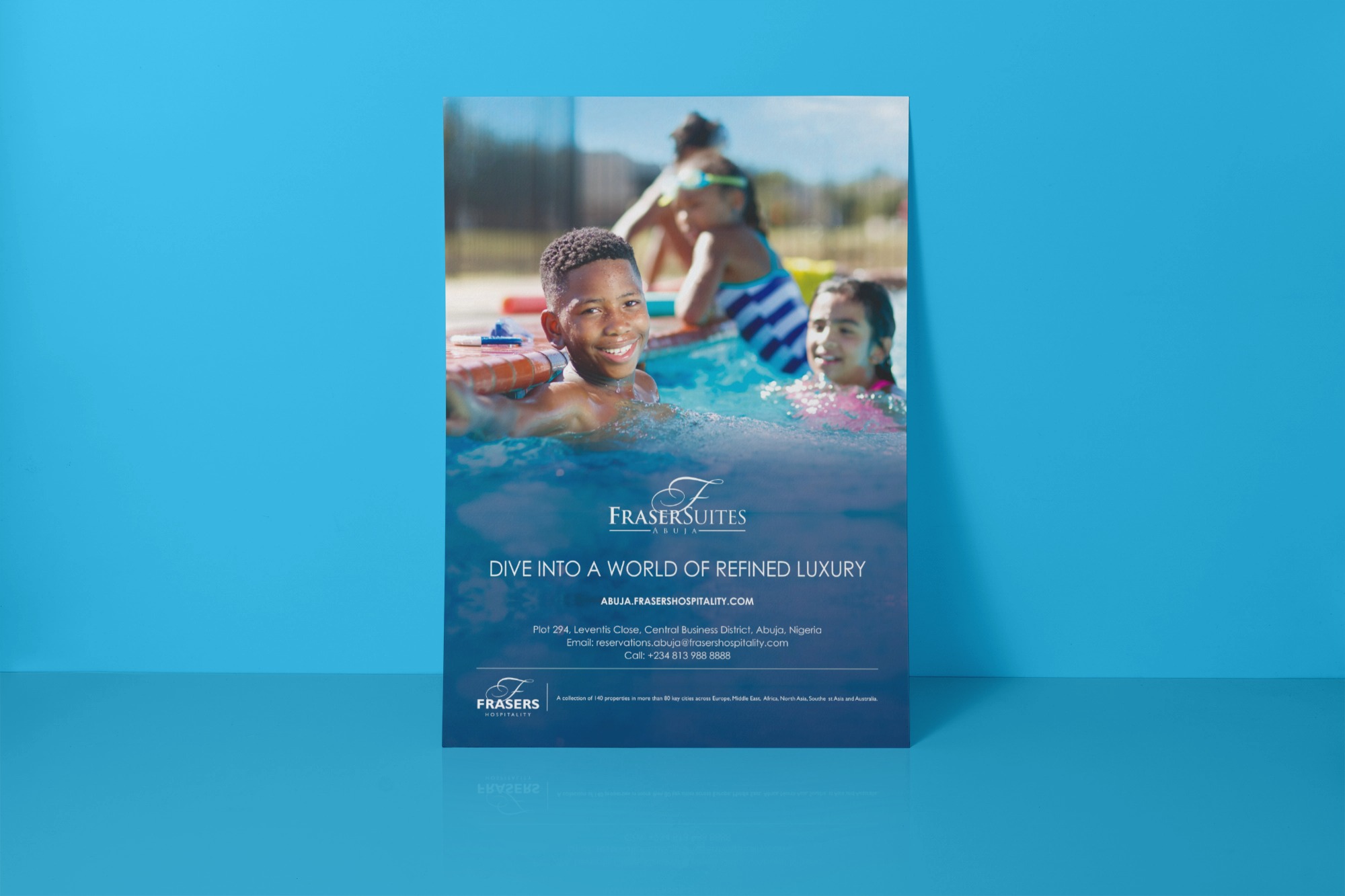 Flyer featuring children enjoying a swimming pool with text promoting Fraser Suites Abuja and their refined luxury accommodations.