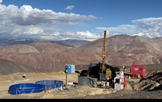 A construction site in the mountainsAI-generated content may be incorrect.