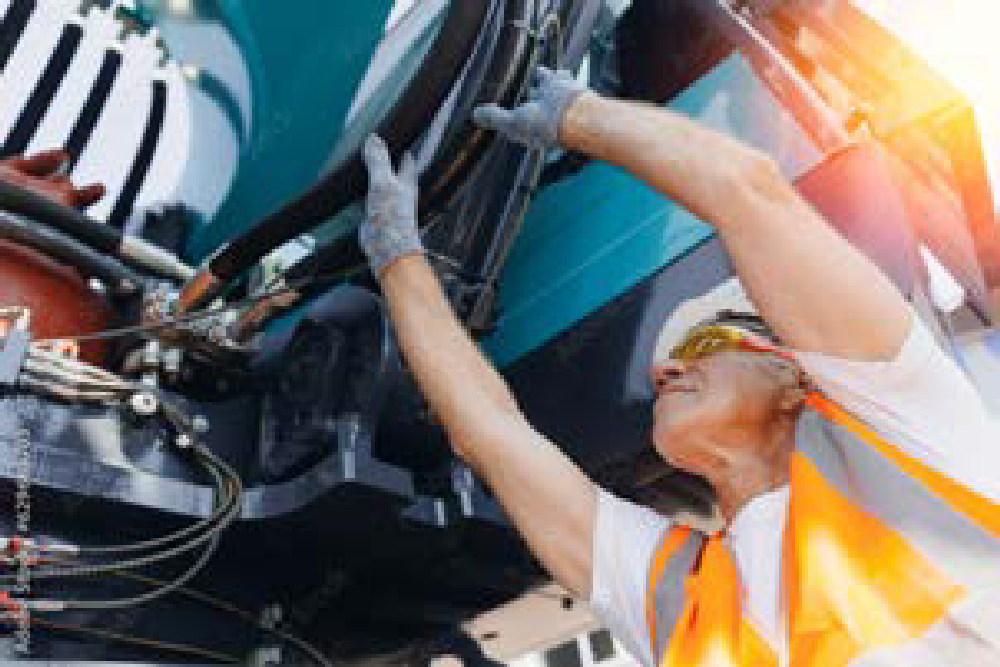 Delta360 technician servicing a fuel delivery truck