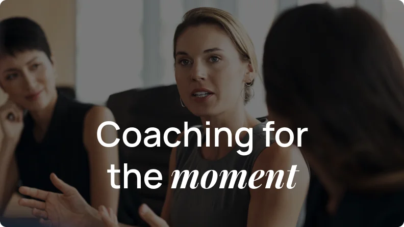 Picture of a professional women in meeting setting running the meeting with title text "Coaching for the moment"