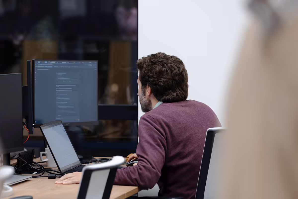 man working with computer