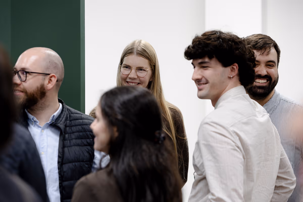 people smiling on an event