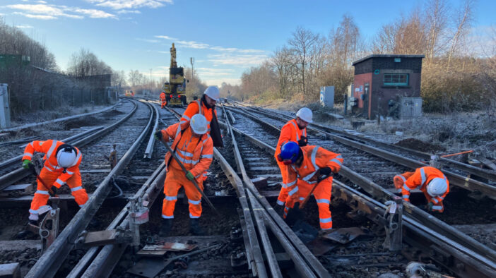 Network Rail team working on a railway track.