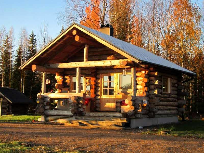 Traditional Finnish sauna cottage in Lapland forest