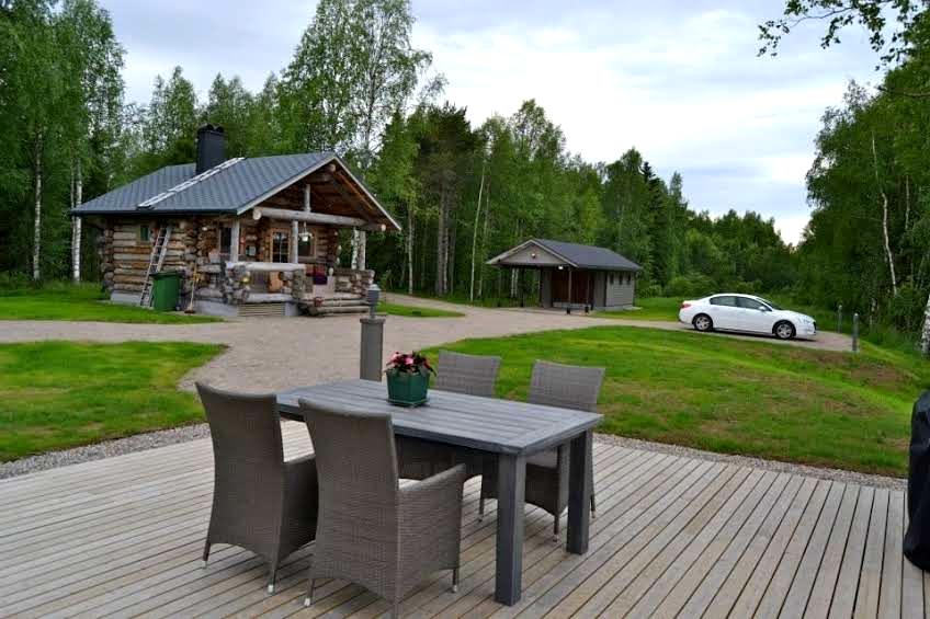 Outdoor terrace at traditional Lapland cottage