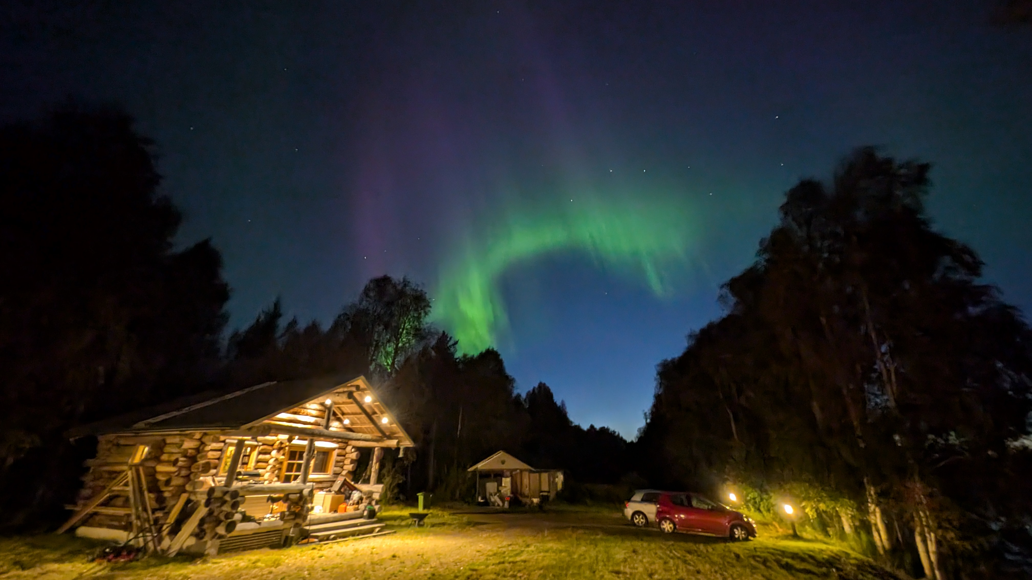 Northern Lights above the Your Lapland sauna cottage in Finnish Lapland