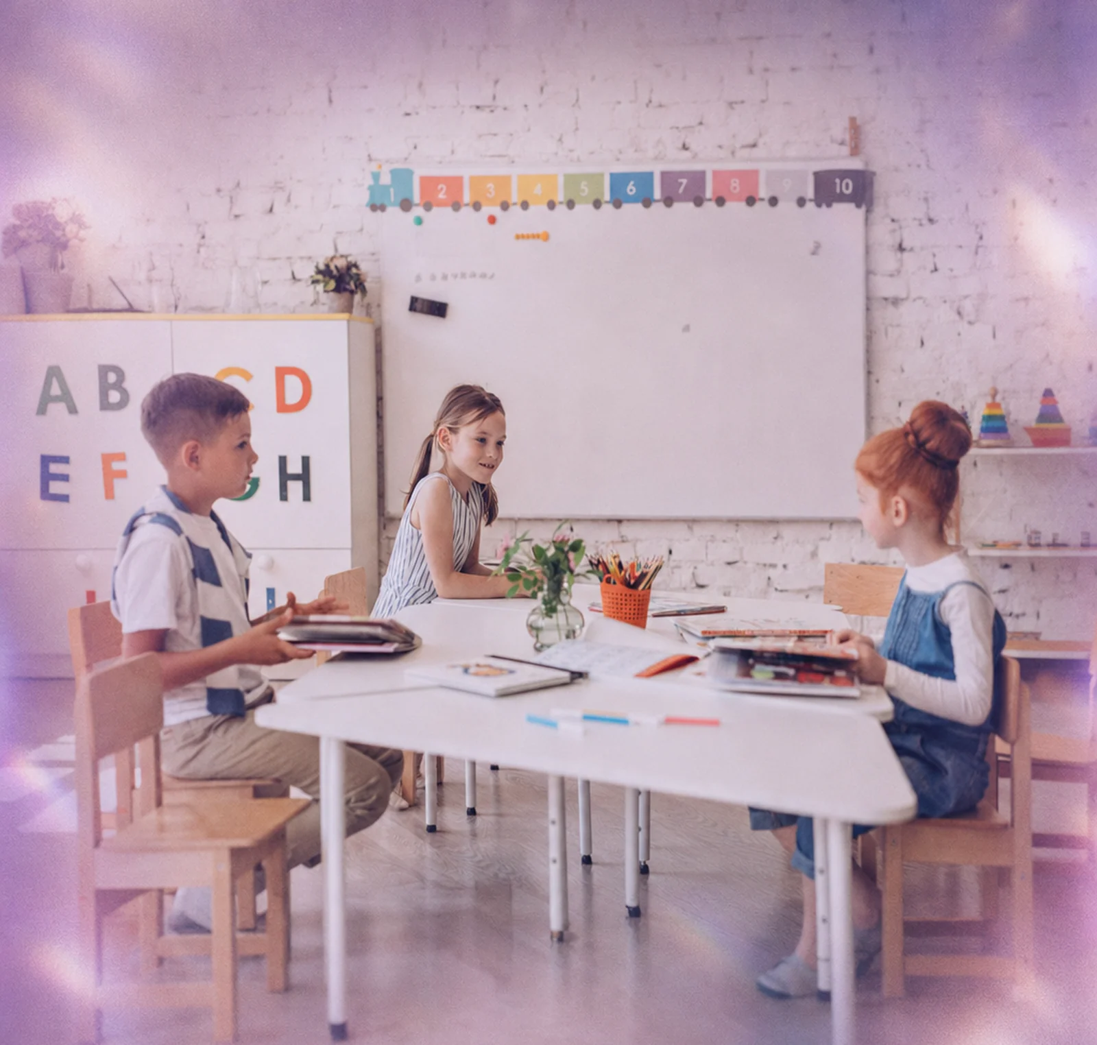 Children working at desks in a classroom