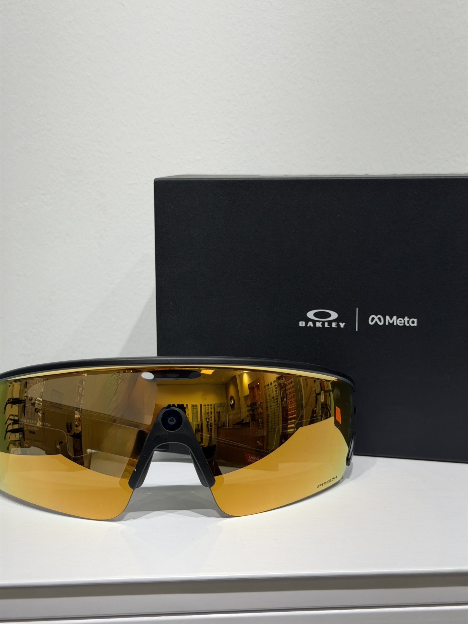 Oakley Meta smart performance sunglasses with mirrored Prizm lenses and integrated camera technology on display
