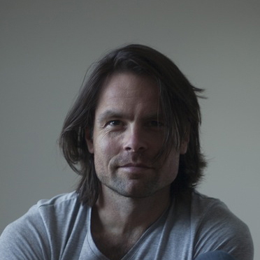 [headshot] image of customer (for a blockchain and cryptocurrency)