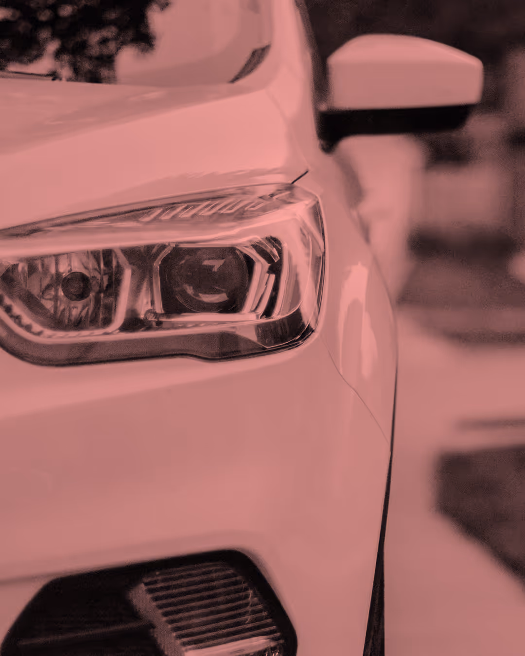 Car front with headlight displayed in a soft color