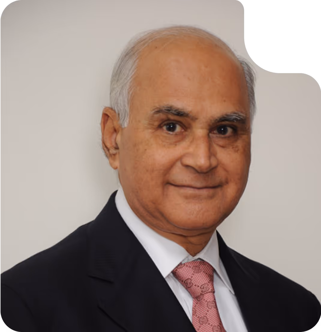 G N Bajpai, Mentor and Co-Founder of GovEVA, former Chairman of SEBI and LIC, experienced corporate governance leader, smiling in a suit and tie.