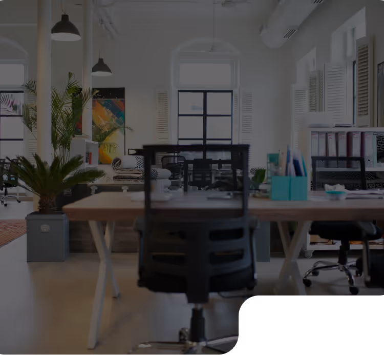 Office interior with desks, chairs, and meeting space