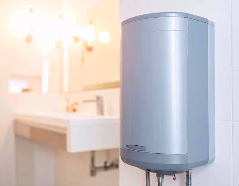 an image of a tankless water heater in a bathroom