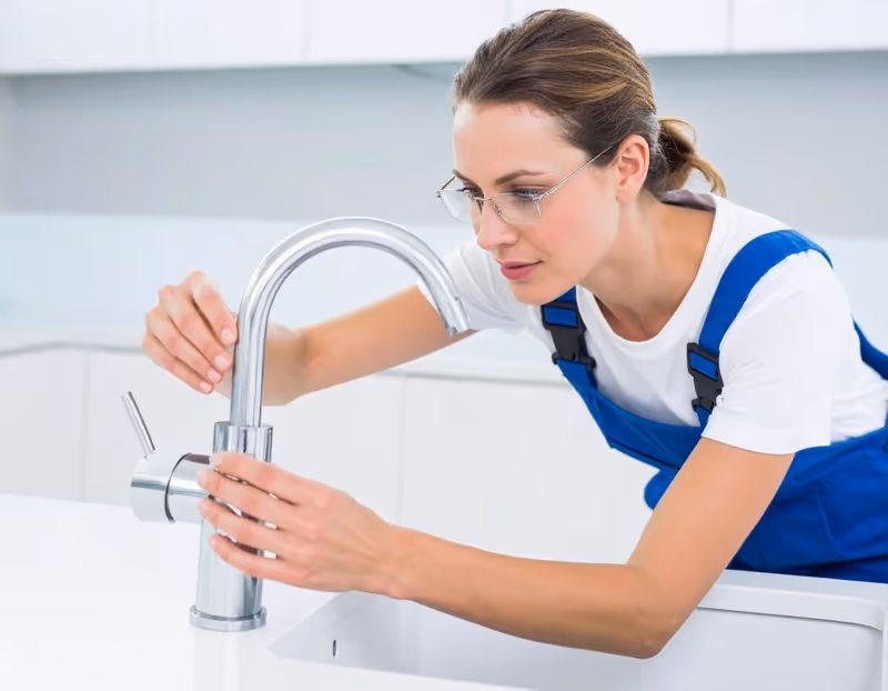 Orlando plumber replacing worn faucet cartridge during repair service call