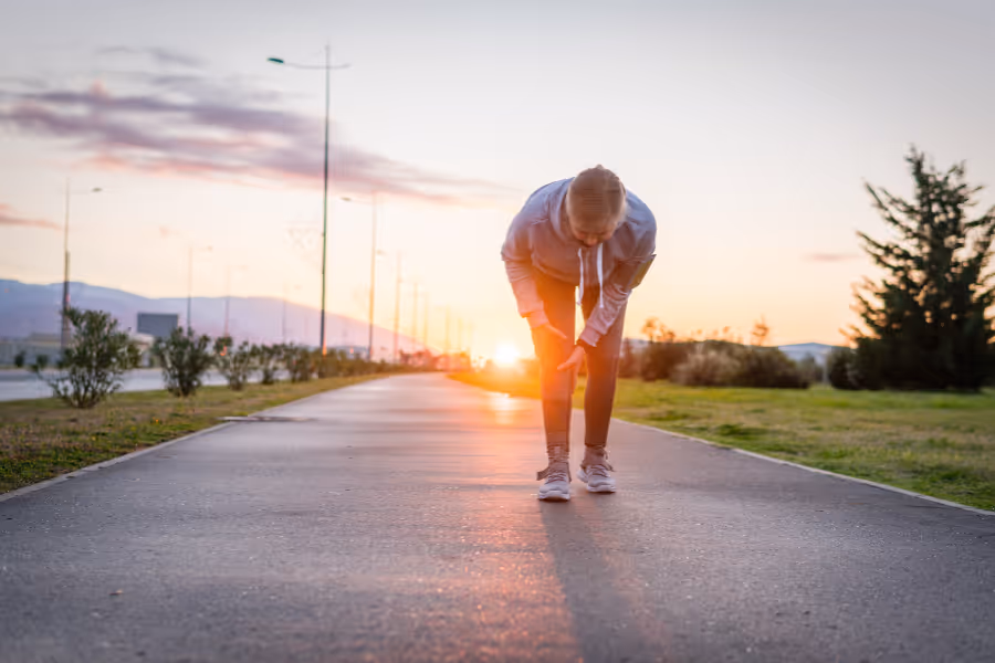 older woman recovering from knee surgery on a low impact run