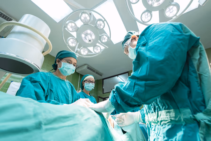 surgeons performing bunion surgery
