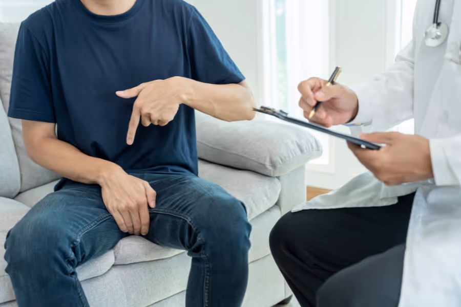 man considering permanent penis enlargement surgery in doctors office