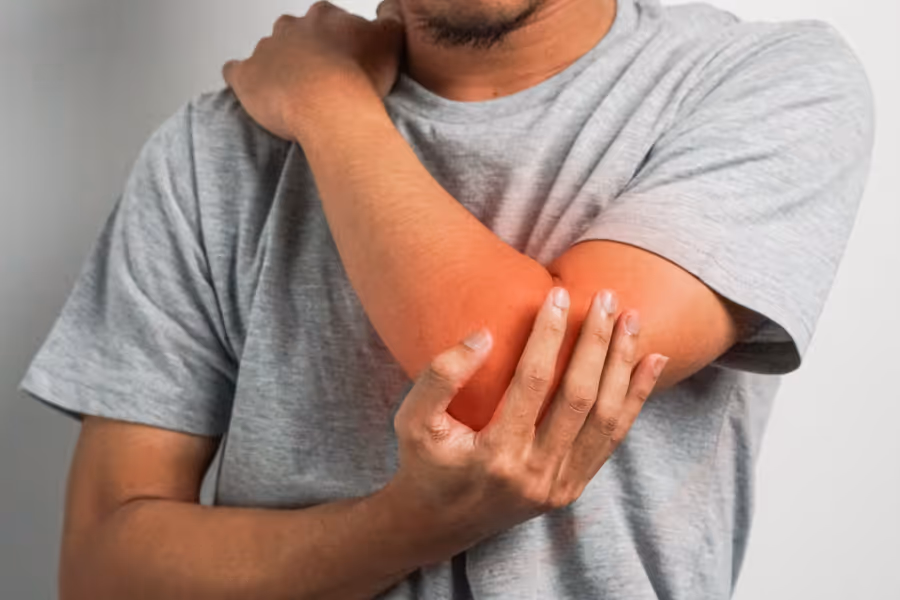 man in elbow pain