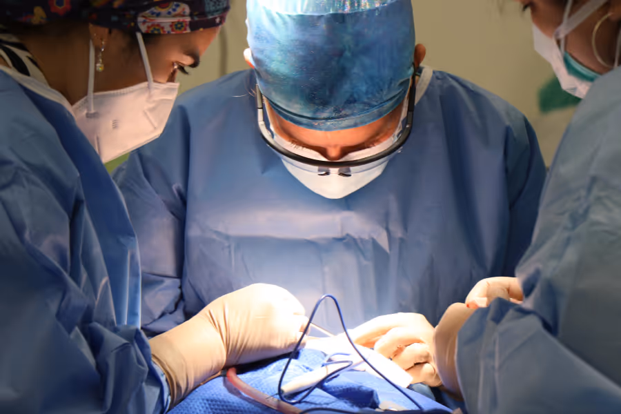 Shoulder surgeons performing surgery